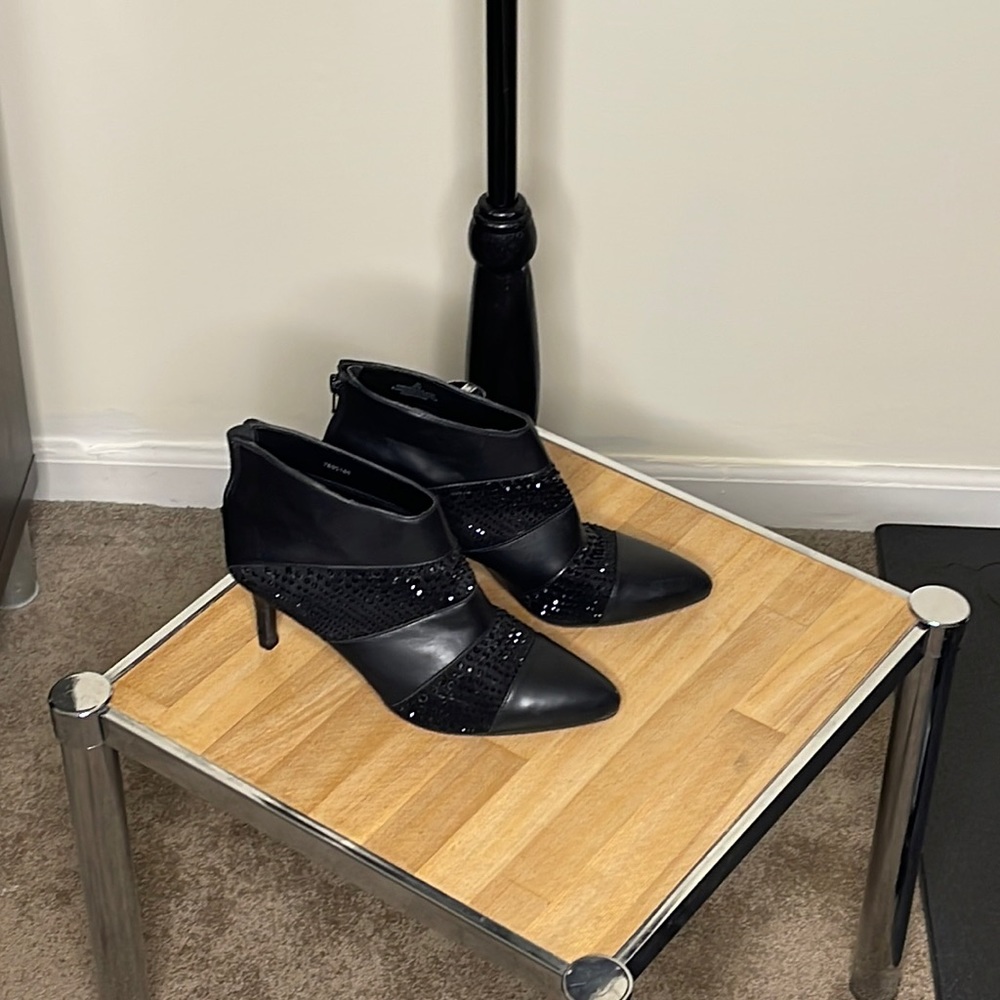 Black booties. Sparkling accents
